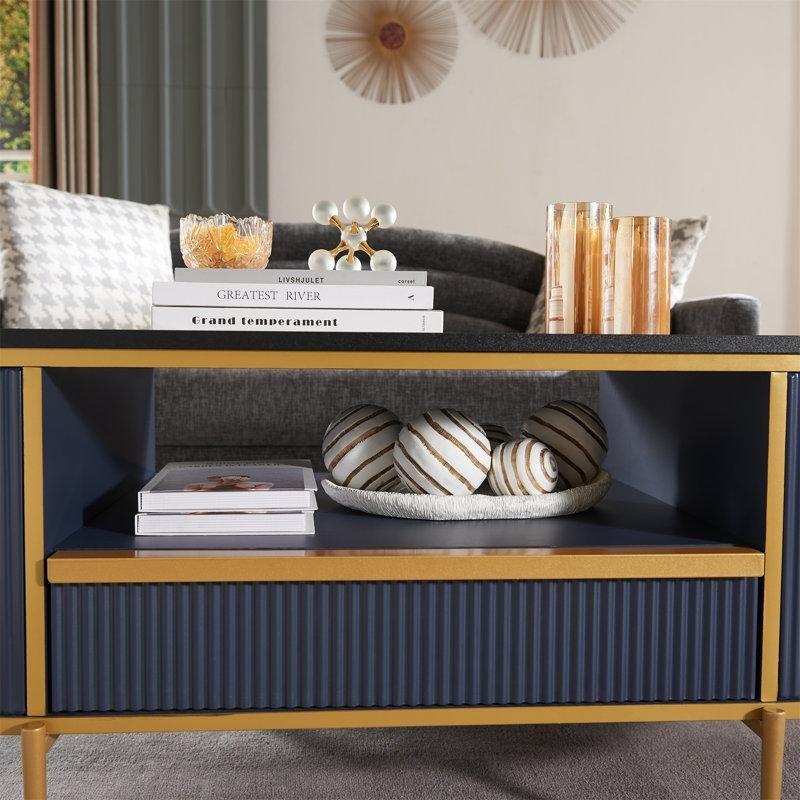 Oymalı Tasarım Lacivert Orta Sehpa 122 cm Mermer Görünümlü Üst ve Gold Metal Ayaklar - 104404