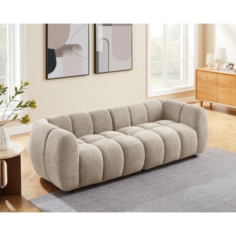 Krem Rengi Bukle Kumaş Kapitoneli Kıvrımlı Tasarım Masif Ahşap Koltuk - 227 cm - 196523