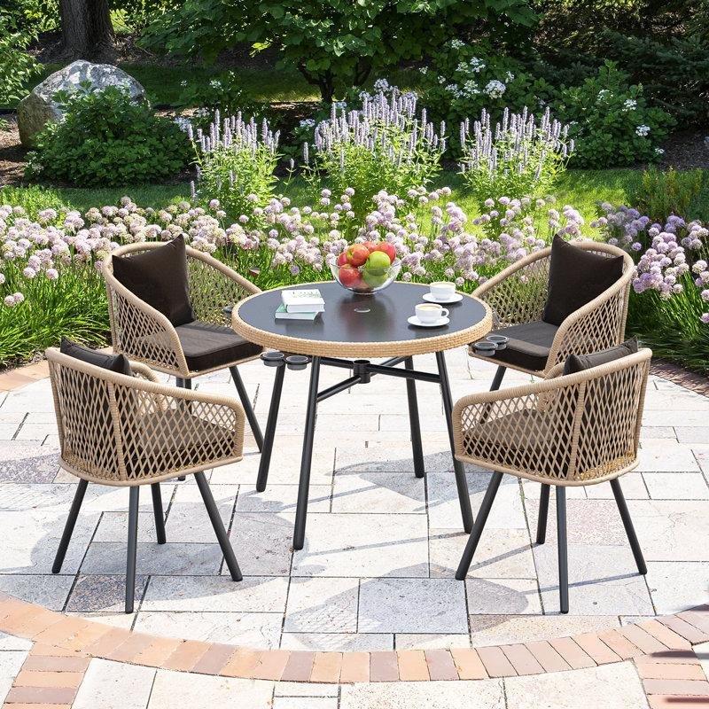 Siyah Rattan Minderli 4 Kişilik Yuvarlak Cam Masalı Çelik Bahçe Masa Takımı - 214887